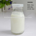 Haonai Eco-Friendly,FDA,SGS food grade 200ml glass milk bottle with seal cover